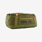 Patagonia Black Hole Duffel 55L in Basin Green with orange trim and handles