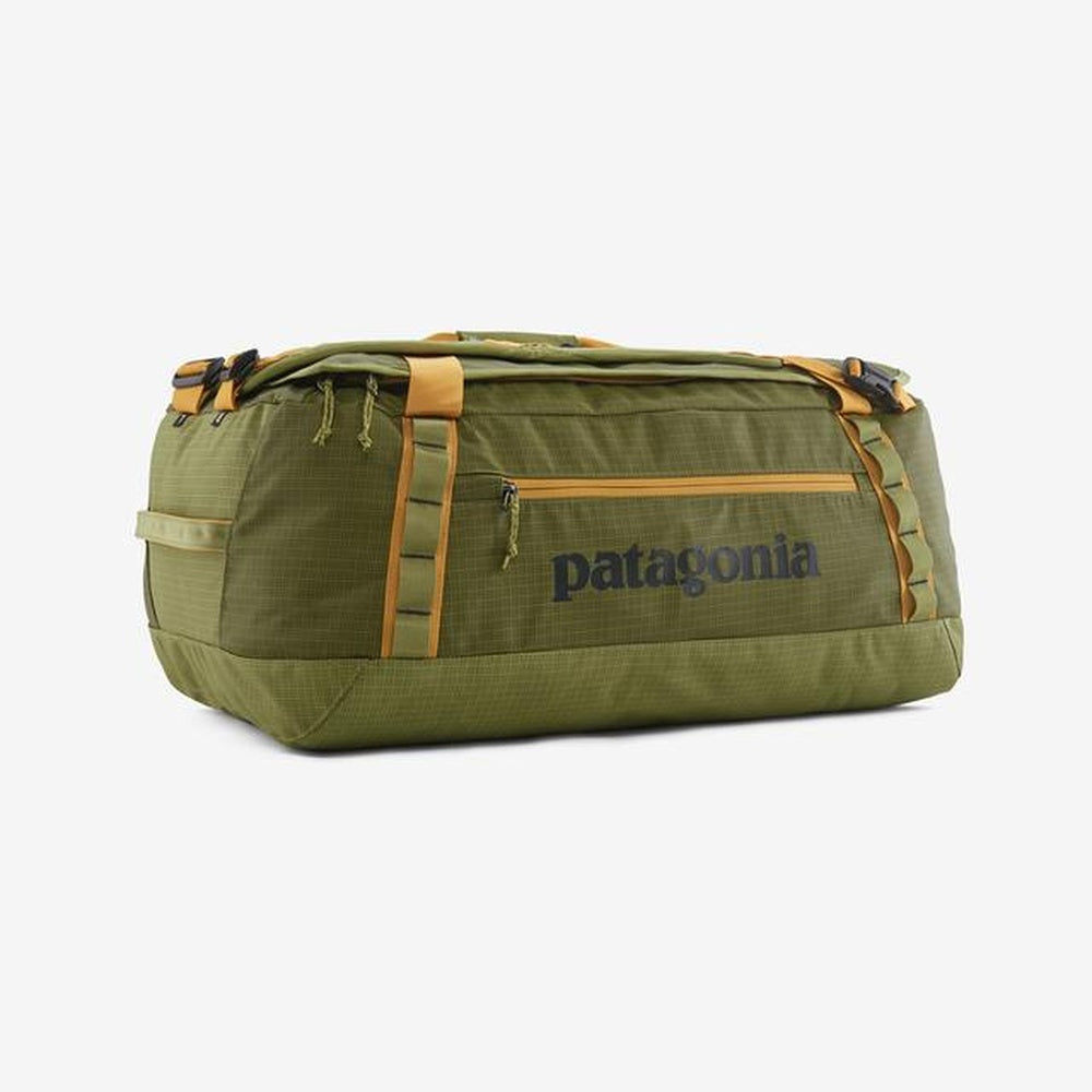 Patagonia Black Hole Duffel 55L in Basin Green with orange trim and handles