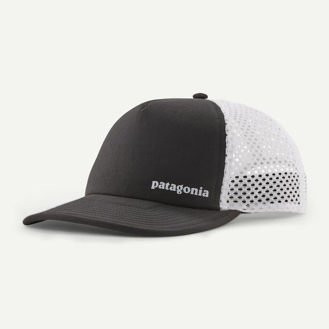 Patagonia black and white mesh trucker hat with logo on clean background