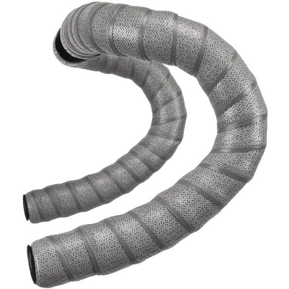 Lizard Skins DSP bar tape in cool gray with textured pattern, curved in S-shape