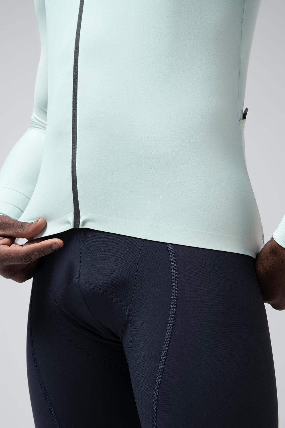 Gobik Avalon long sleeve cycling jersey in halcyon mint green with navy shorts