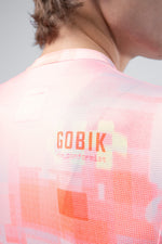 Gobik Vanquish long sleeve cycling jersey in flamingo pink gradient pattern