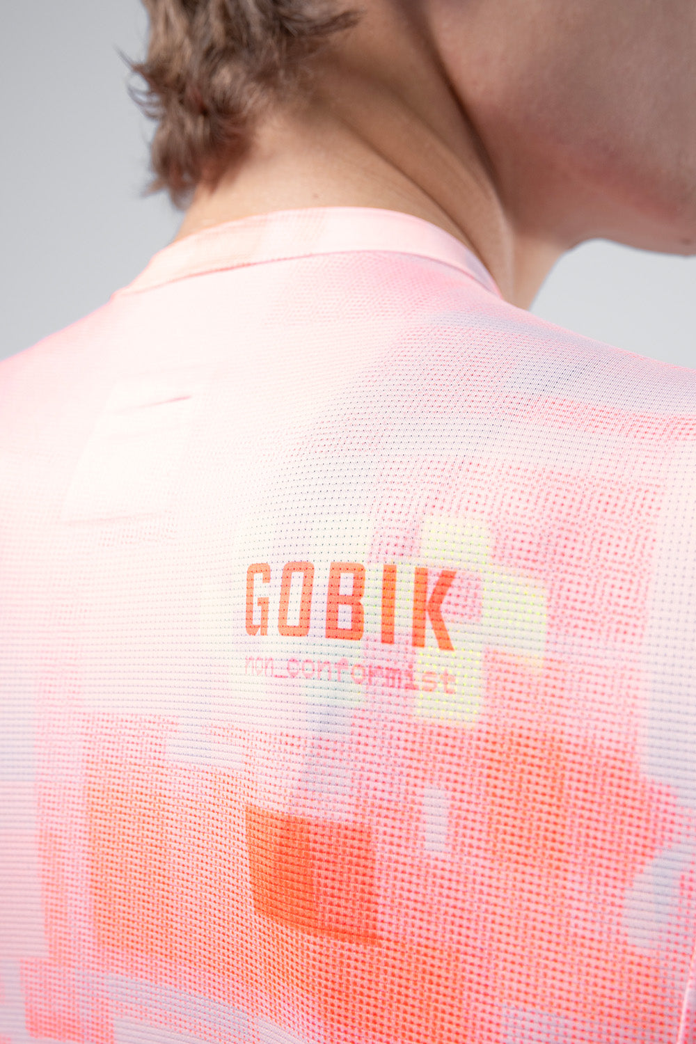 Gobik Vanquish long sleeve cycling jersey in flamingo pink gradient pattern