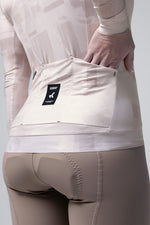 Gobik Vanquish long sleeve jersey in whisper pink worn by model showing back detail