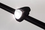 Black Eltin 35 lumen LED bike light mounted on handlebar with bright illumination