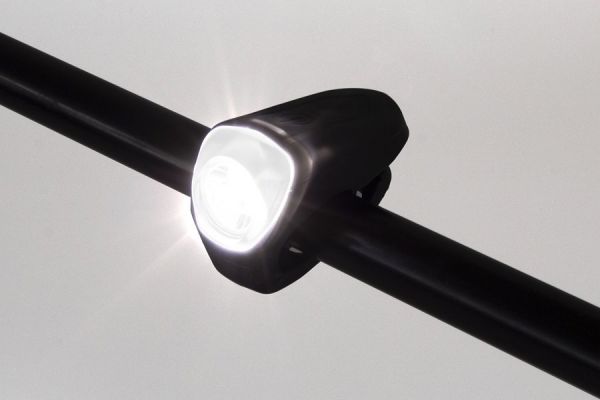 Black Eltin 35 lumen LED bike light mounted on handlebar with bright illumination