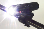 ELTIN Pro 850 lumen black bike light mounted on handlebar with bright LED beam