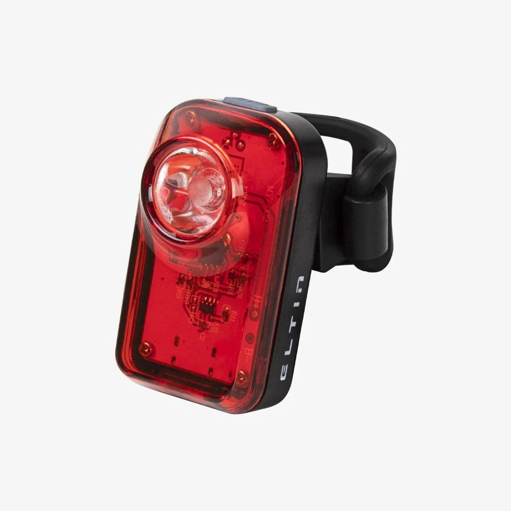 Eltin Explorer red LED rear bike light with mounting strap on white background