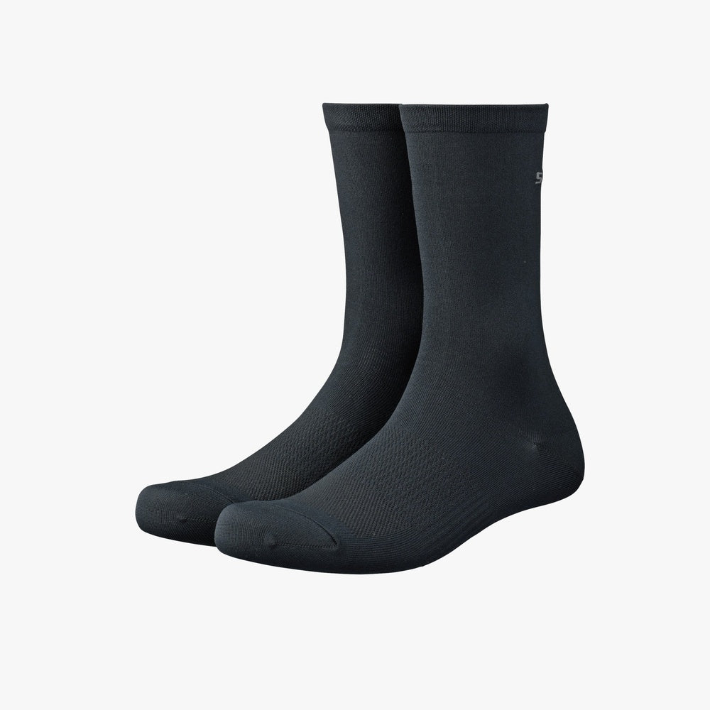 Shimano Performance black cycling socks pair shown standing upright on white background