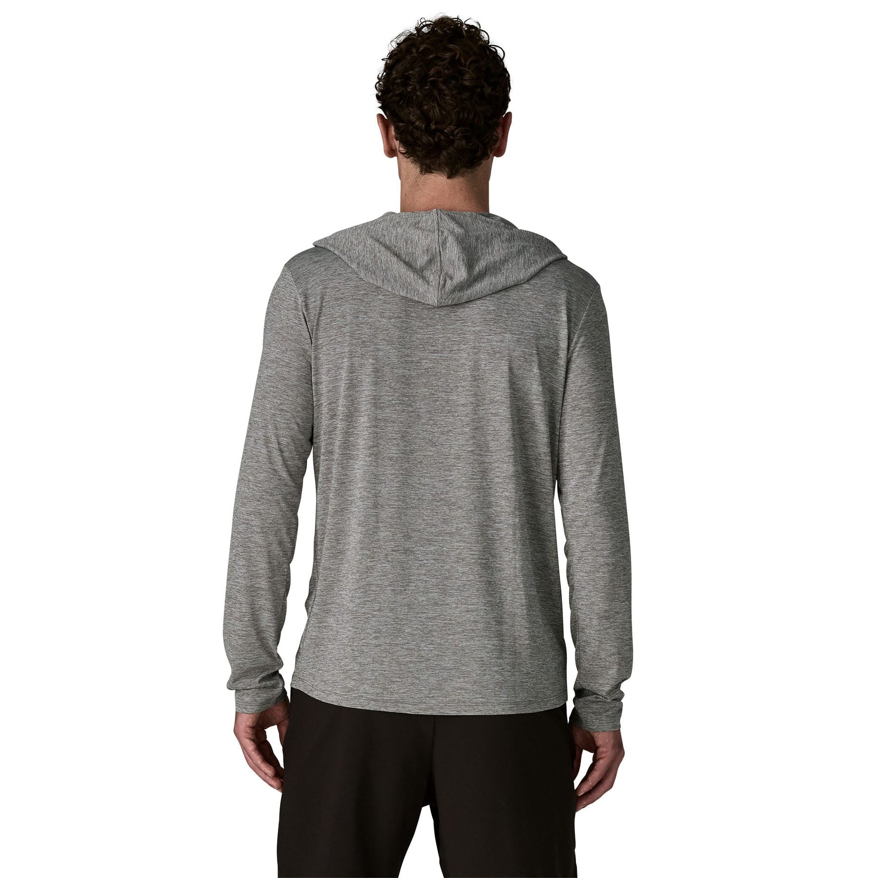 Back view of man wearing Patagonia grey hooded long sleeve shirt