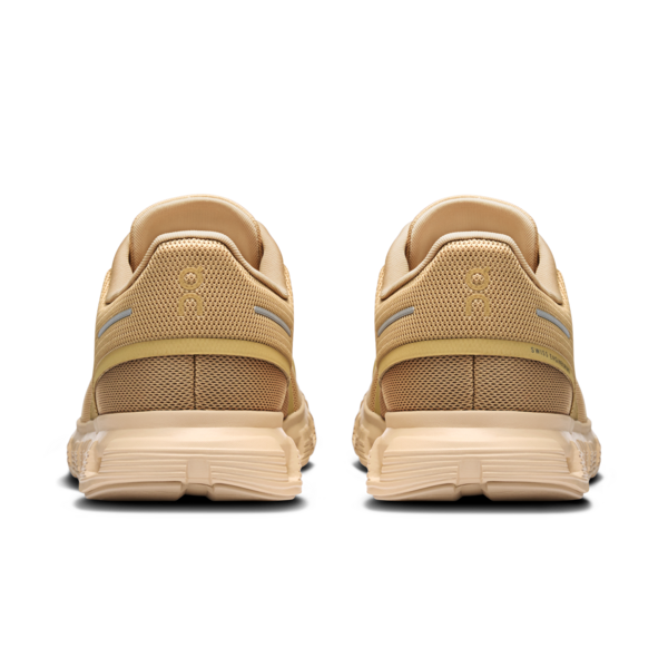 On Cloud 6 running shoes in chai and sand colorway, rear view