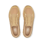 On Cloud 6 running shoes in chai sand colorway on white background
