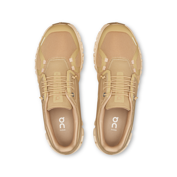 On Cloud 6 running shoes in chai sand colorway on white background
