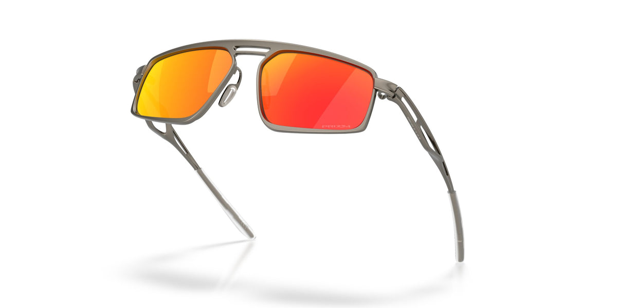 Oakley Bushwick sunglasses angled underside view with gunmetal frame and Prizm Ruby lenses