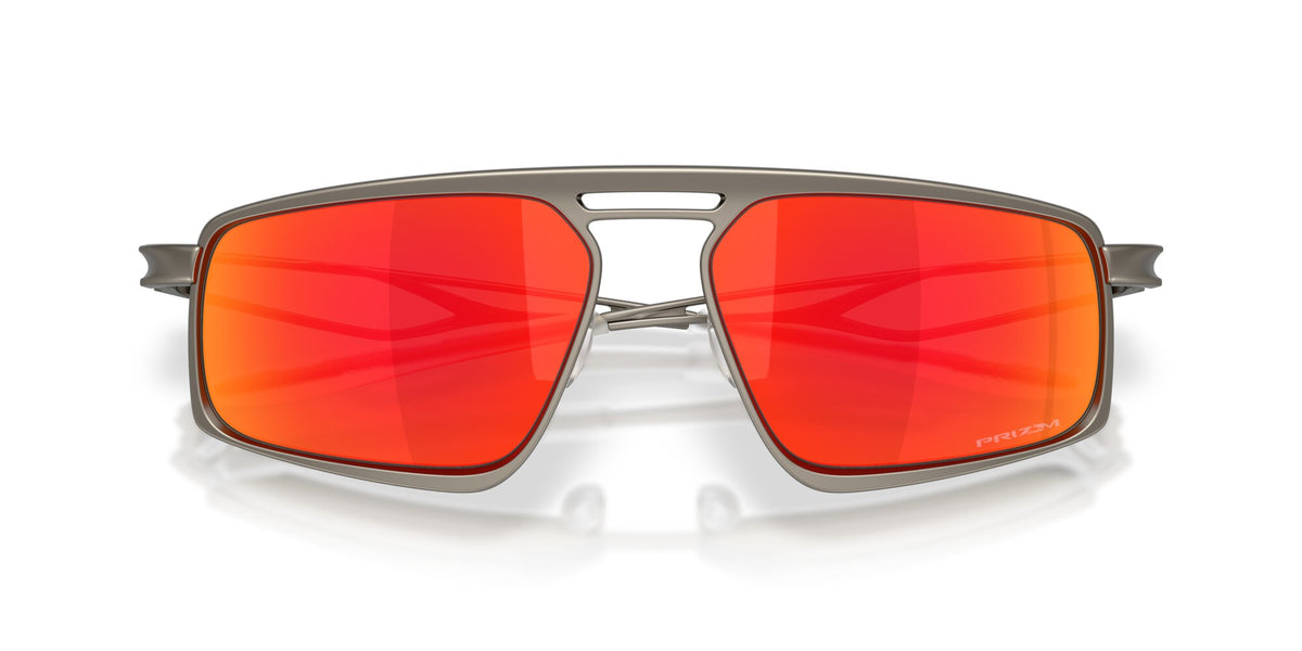 Oakley Bushwick sunglasses front view showing gunmetal frame and bold red-orange Prizm Ruby lenses