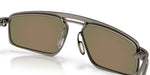 Close-up detail of Oakley Bushwick sunglasses showing gunmetal frame and nose bridge construction