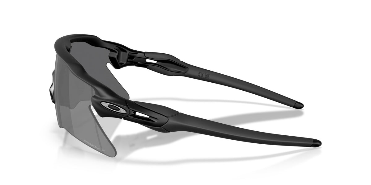 Oakley Radar EV Heater sunglasses in matte black with Prizm Black polarized lenses, side angle view