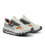 On Cloudhorizon men's running shoes in aloe green with orange details and signature sole