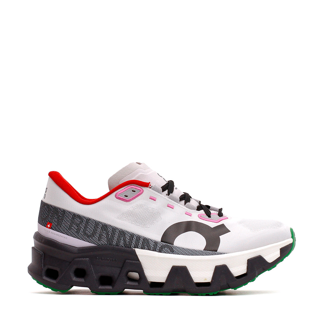 On Cloudmonster Hyper running shoe in white and gray colorway with distinctive CloudTec sole