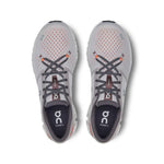 On Cloud X 4 running shoes in silver with orange flame accents, top view