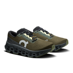 On Cloudmonster 3 running shoes in olive green and black colorway on white background