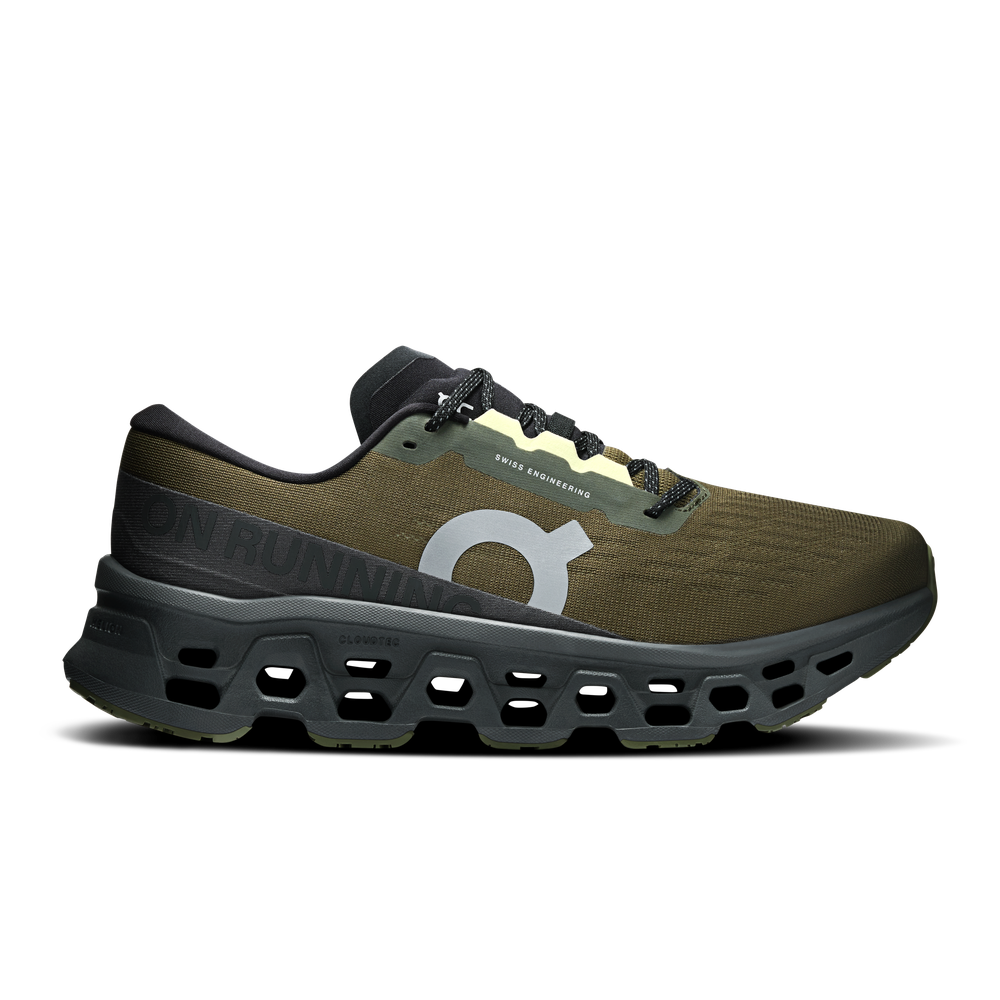 On Cloudmonster 3 running shoe in olive green and eclipse colorway with distinctive cloud sole