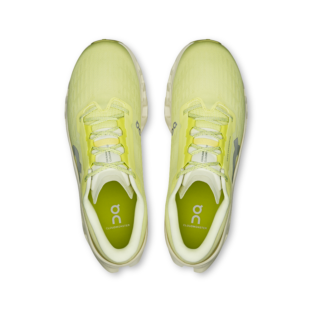 On Cloudmonster running shoes in bright lime green colorway, top-down view