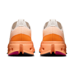 On Cloudsurfer Max men's running shoes in pearl and tangerine gradient colorway, rear view