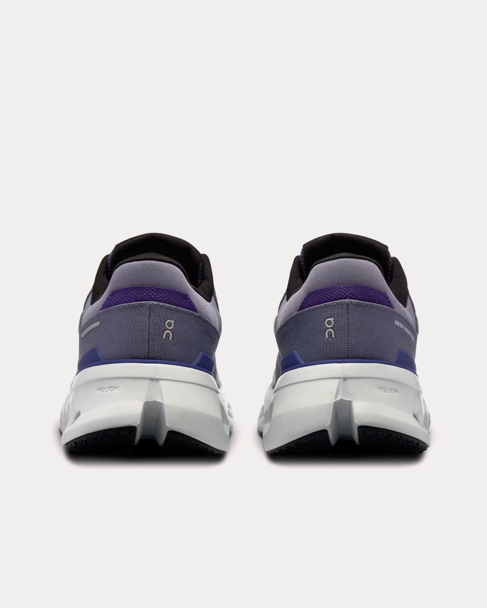 On Cloudrunner 2 running shoes in grey and purple colorway, rear view