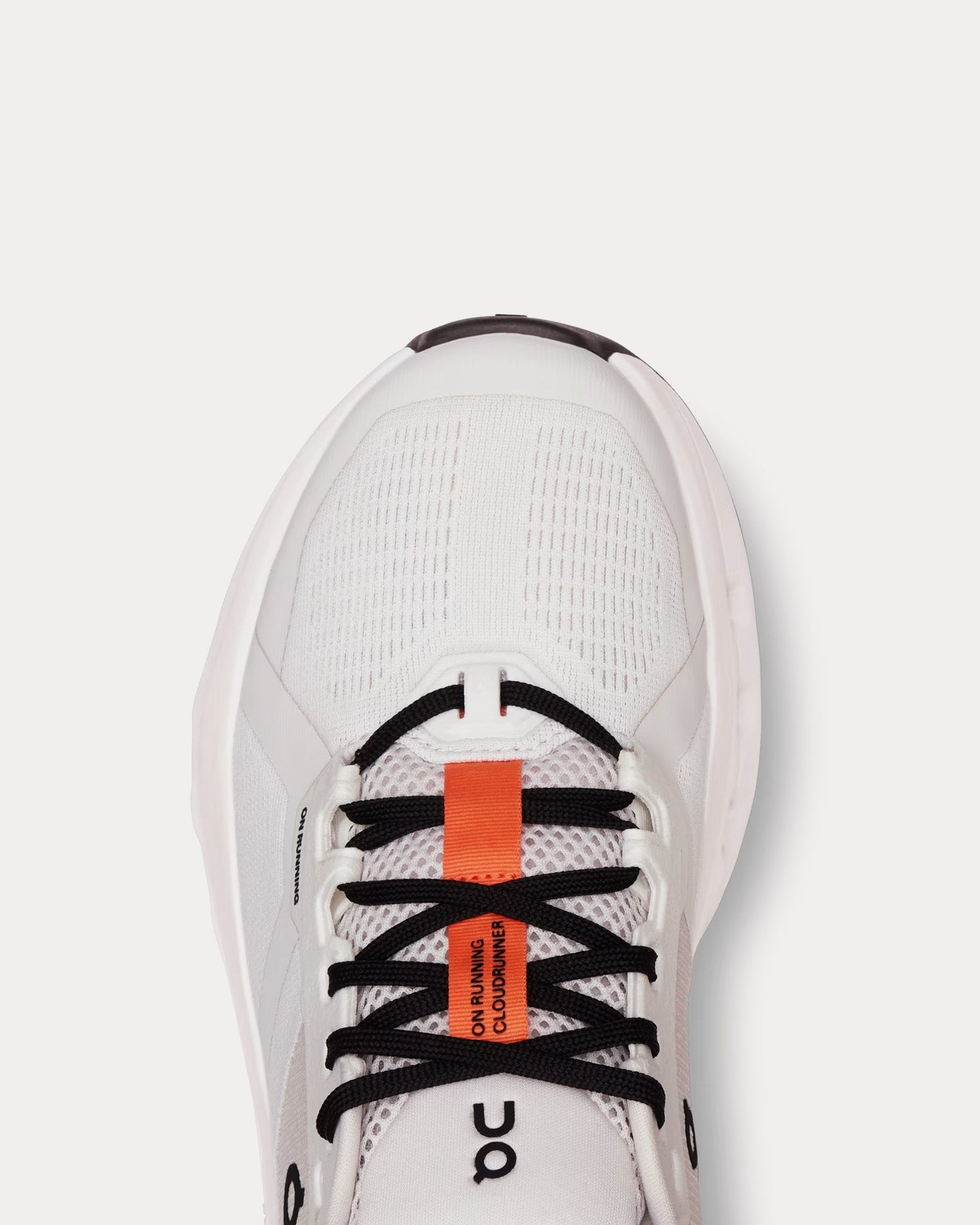 On Cloudrunner 2 running shoe in white with orange lacing system details