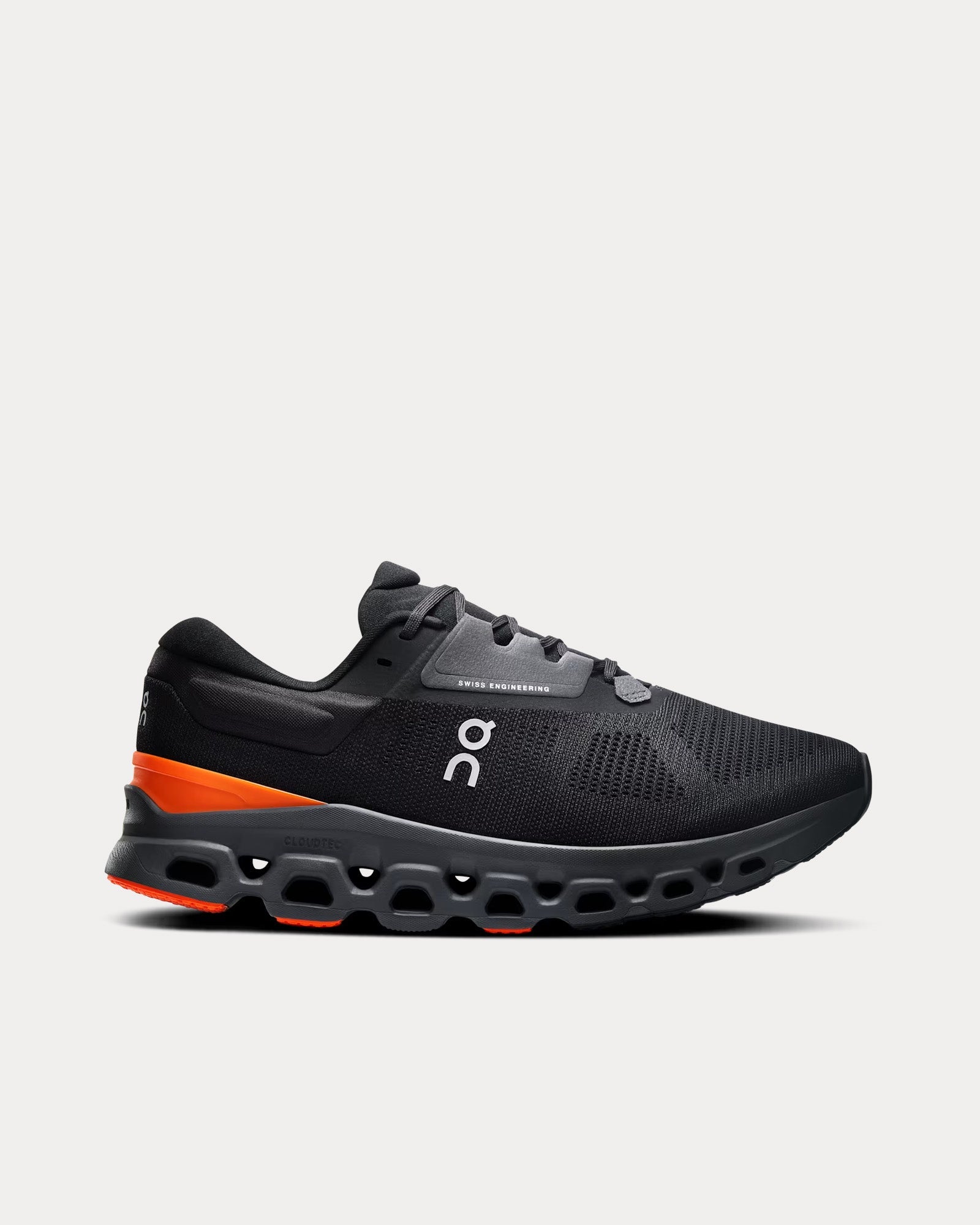 On Cloudstratus 3 running shoe in black with orange accents and CloudTec sole
