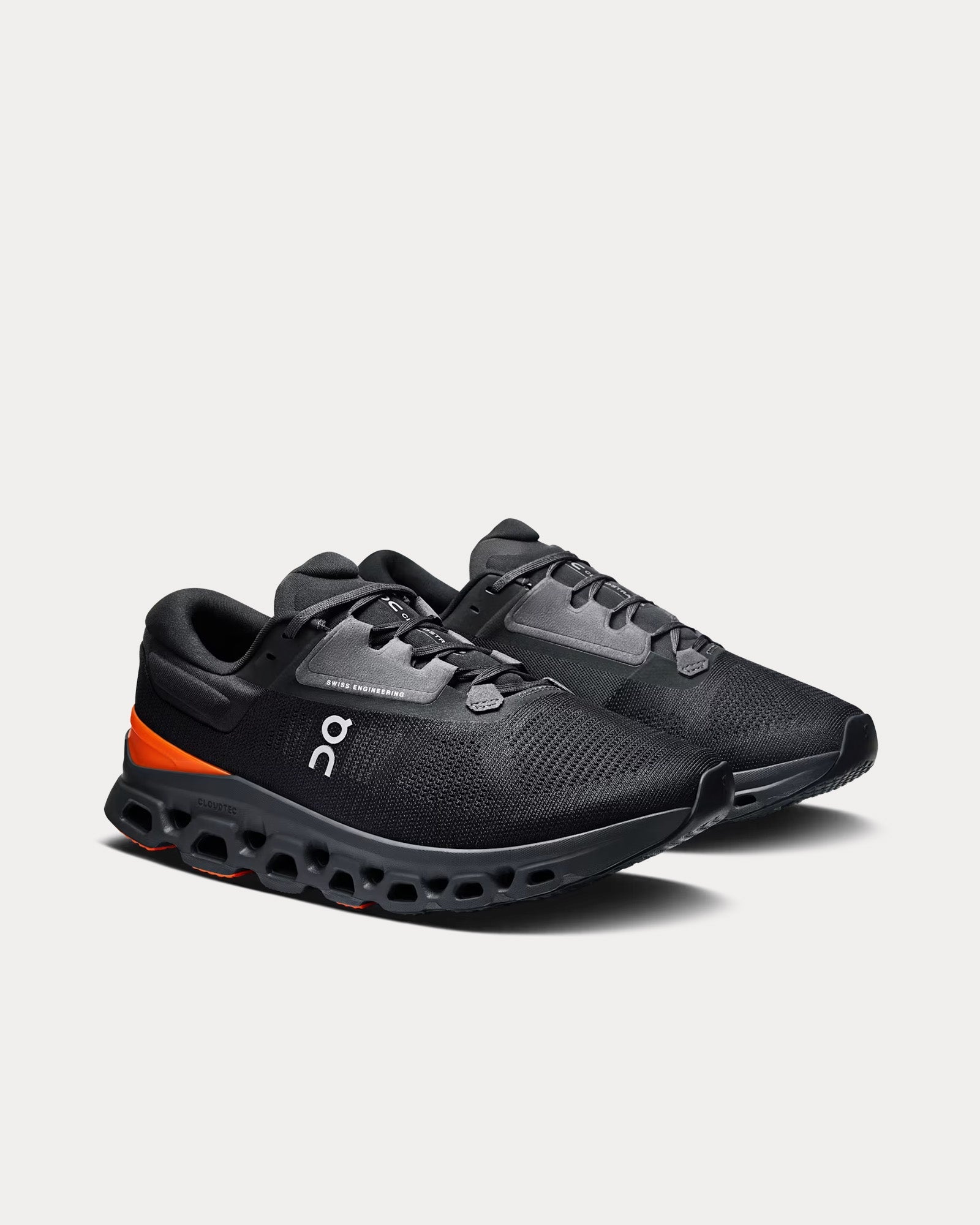 On Cloudstratus 3 running shoes in black with orange flame accents