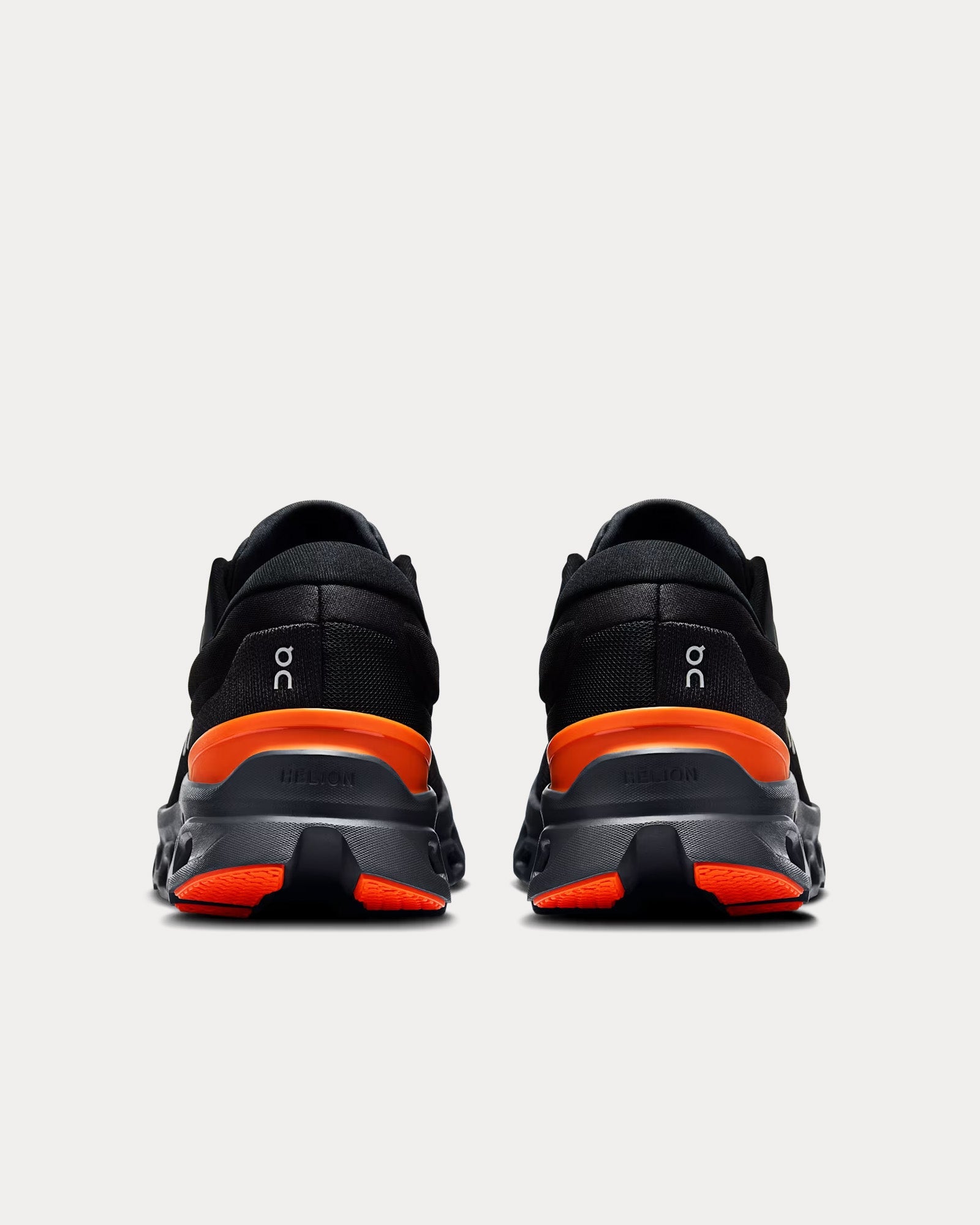 On Cloudstratus 3 men's running shoes in black with orange details, rear view
