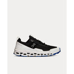 On Cloudultra men's running shoe in black and white with blue outsole, lateral view