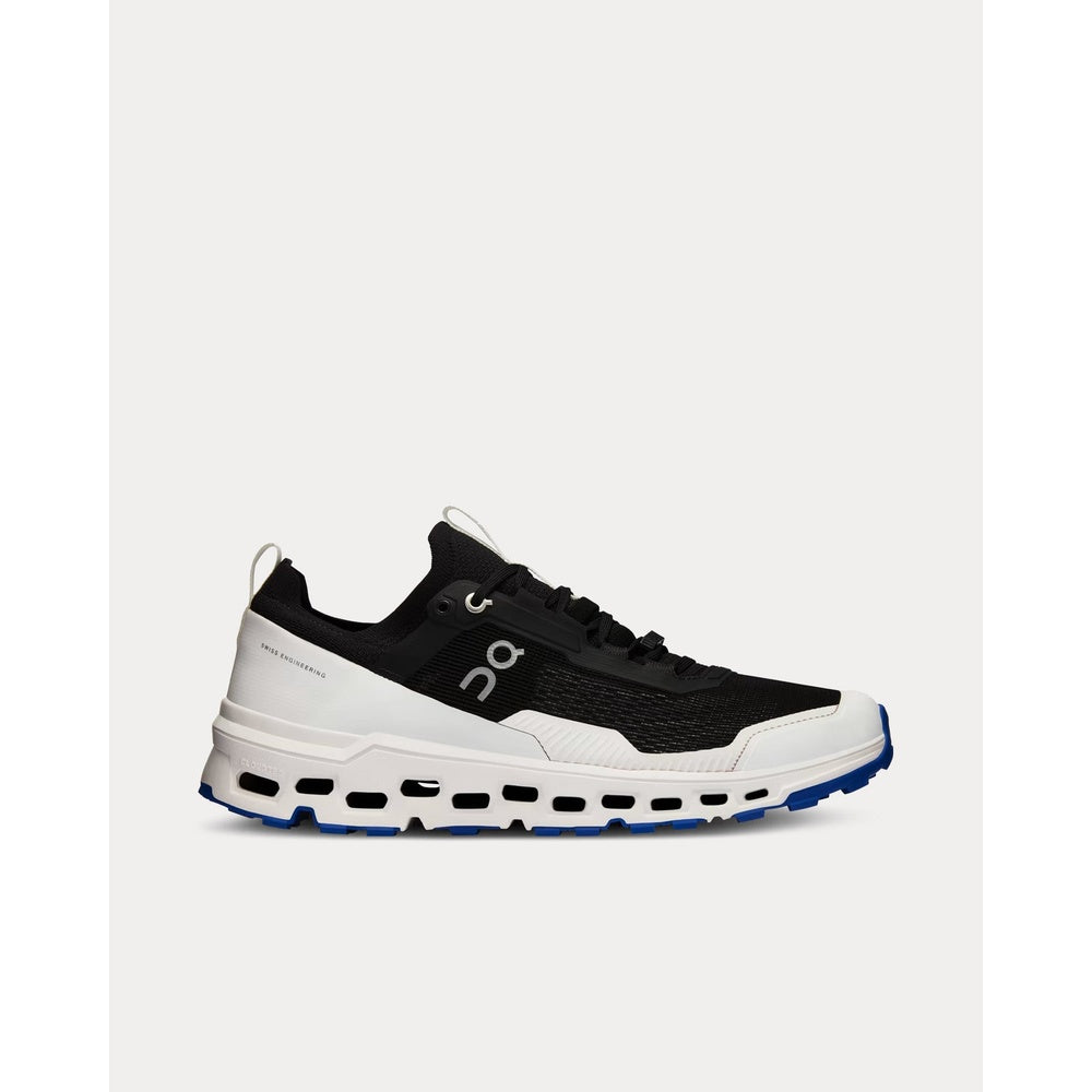 On Cloudultra men's running shoe in black and white with blue outsole, lateral view