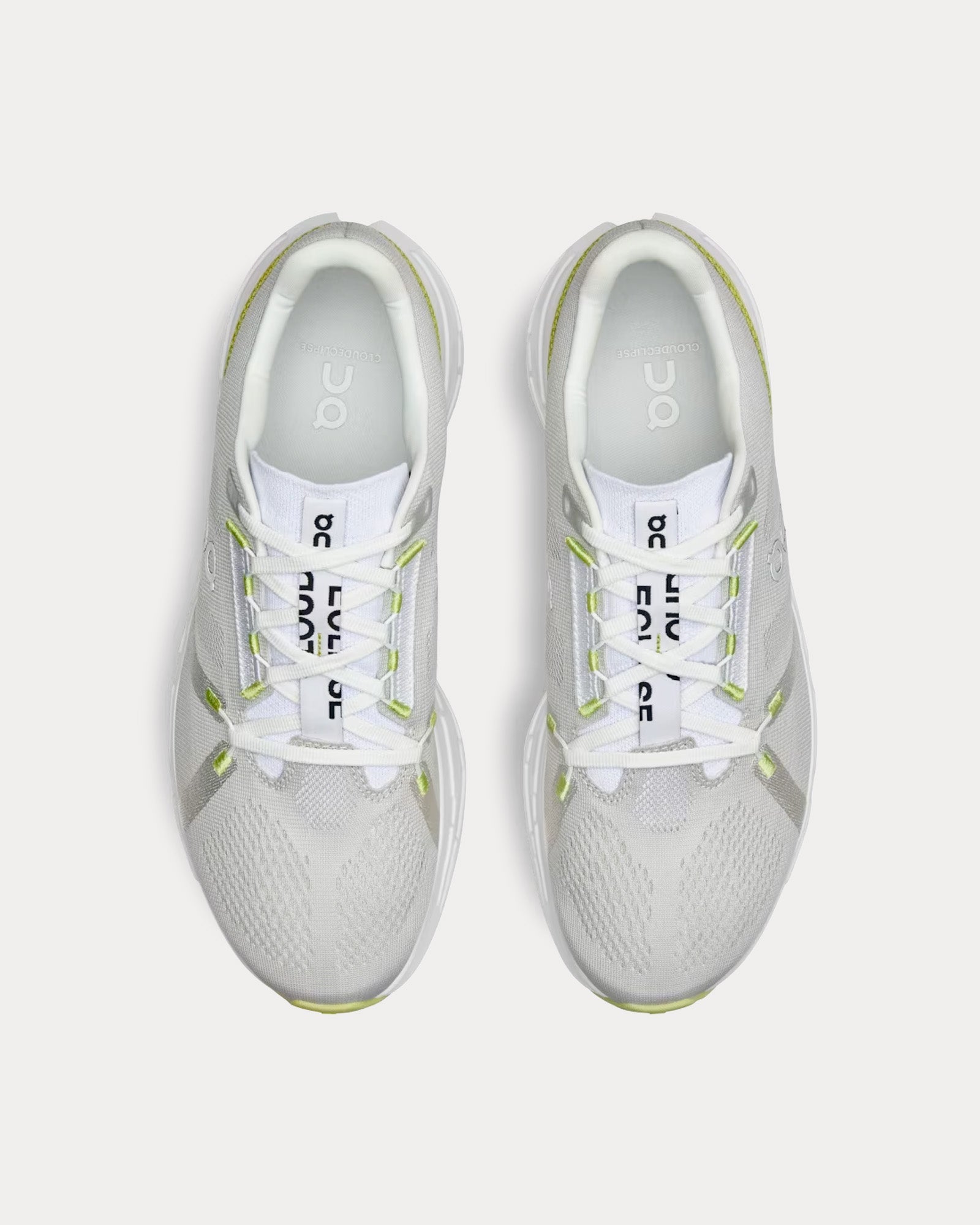 On Cloudeclipse men's running shoes in light gray and white with lime accents