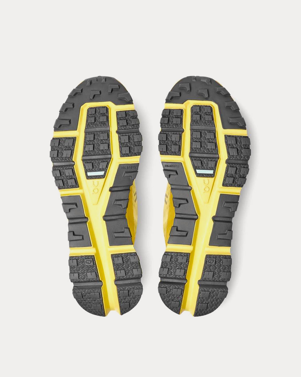 On Cloudultra men's running shoe outsole view showing yellow Cloudtec midsole and gray rubber tread