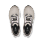On Cloudmonster 3 running shoes in ivory and tin colorway, top view