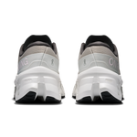 On Cloudmonster 3 running shoes in ivory and tin colorway, rear view