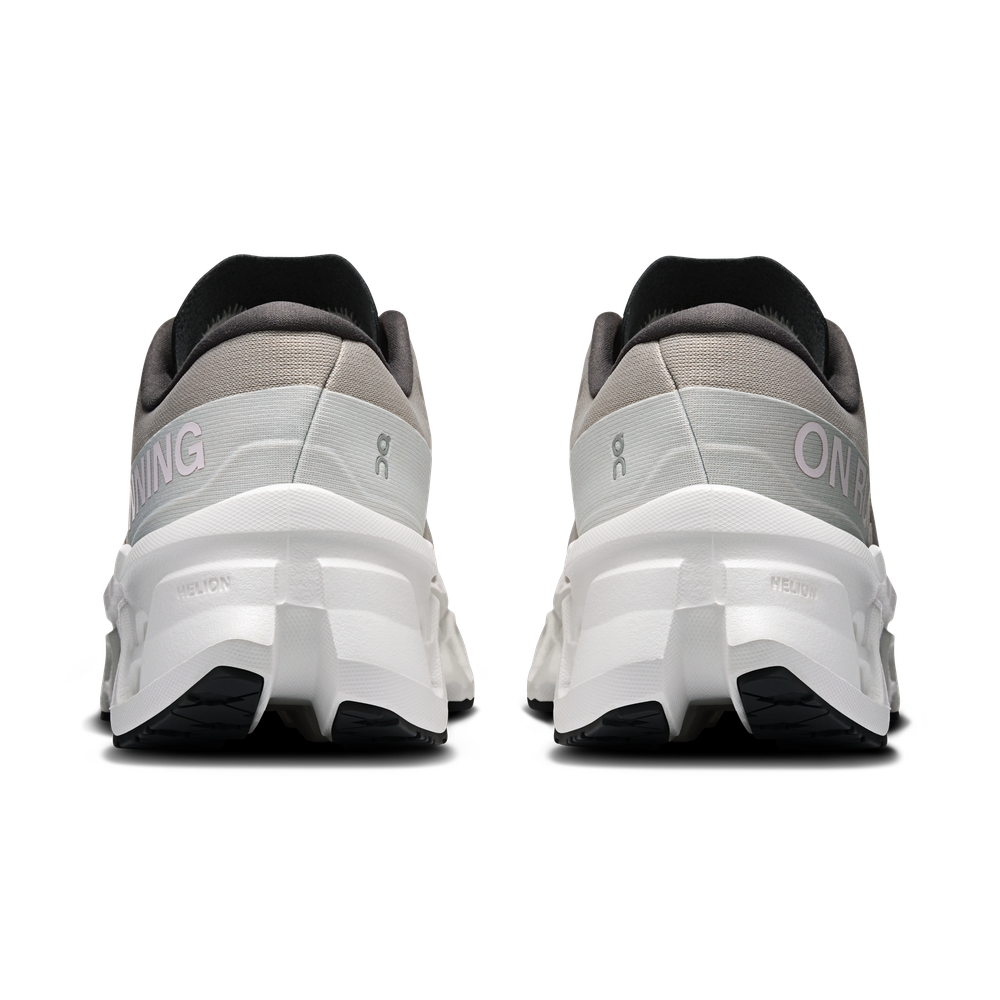 On Cloudmonster 3 running shoes in ivory and tin colorway, rear view