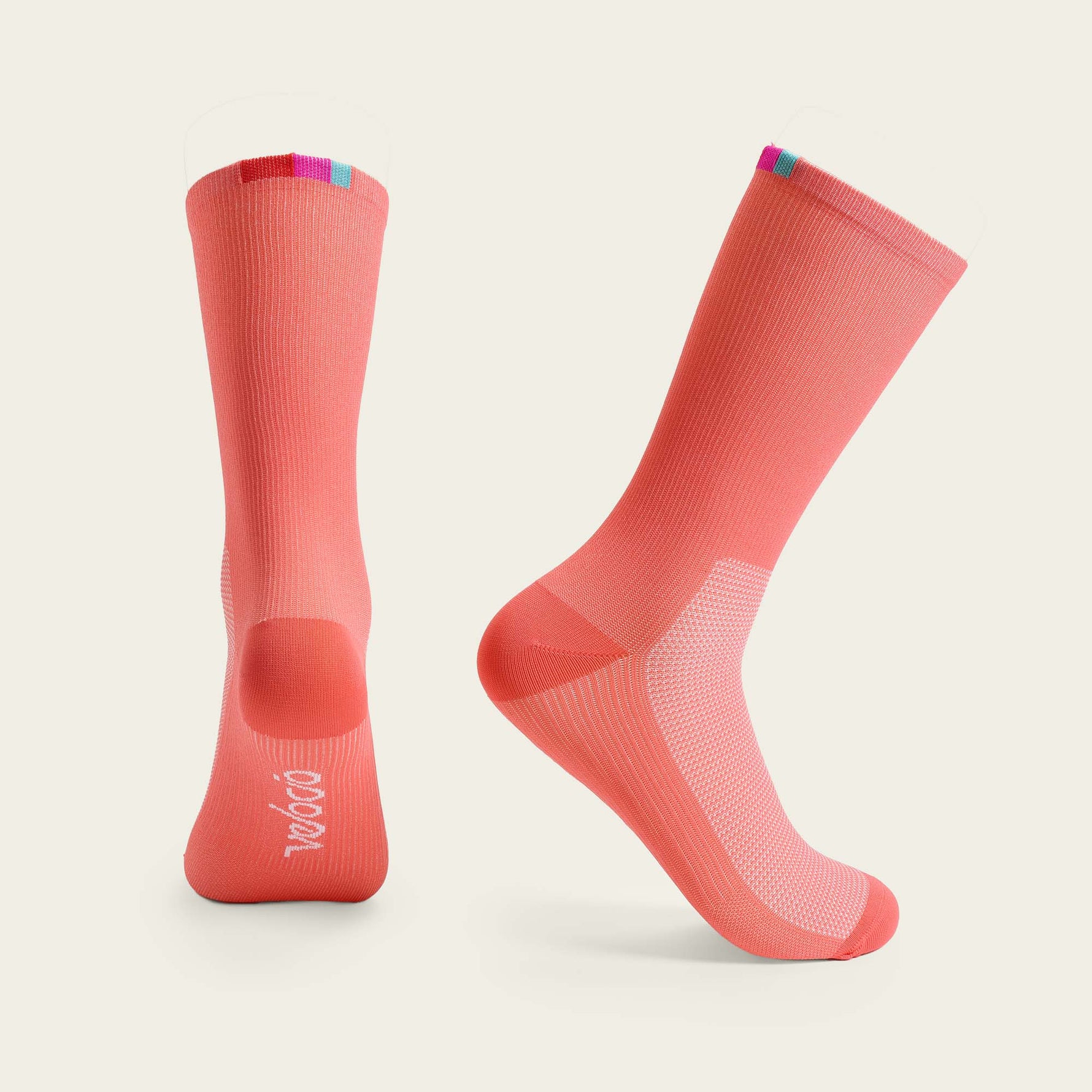 Velocio Terra cycling socks in coral pink with multicolor cuff details