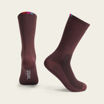 Velocio Terra cycling socks in burgundy with colorful cuff stripes, studio product shot