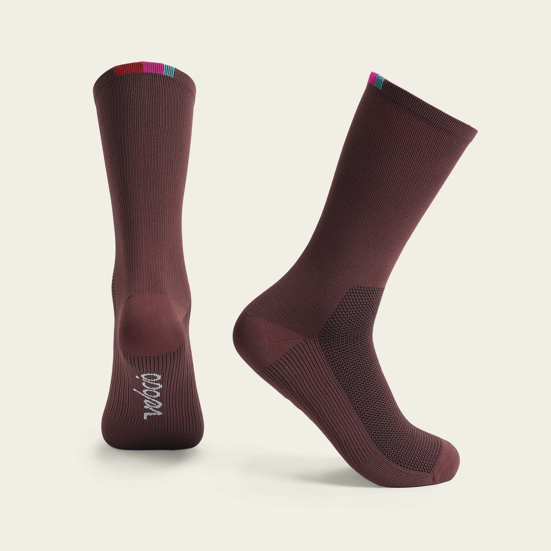 Velocio Terra cycling socks in burgundy with colorful cuff stripes, studio product shot
