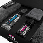 Muc-Off ceramic coating kit with two bottles and microfiber cloths in black case