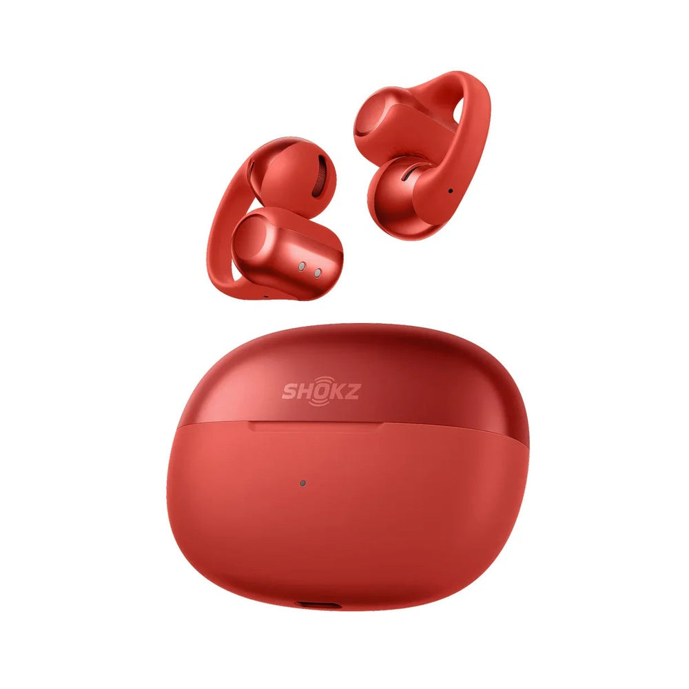 Shokz OpenDots ONE red wireless earbuds floating above matching red charging case