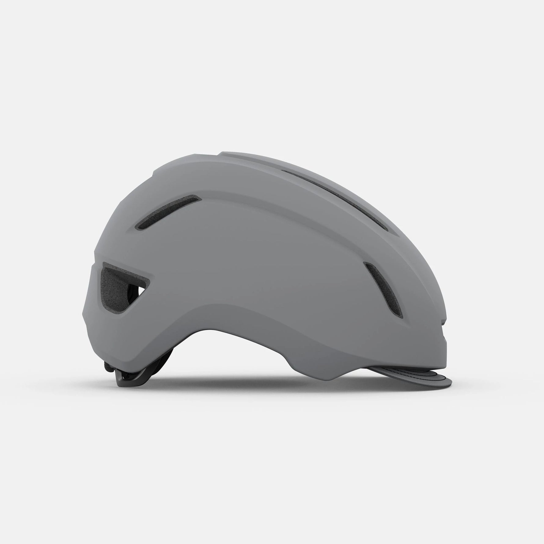 Giro Caden bicycle helmet in matte grey color shown from side profile view