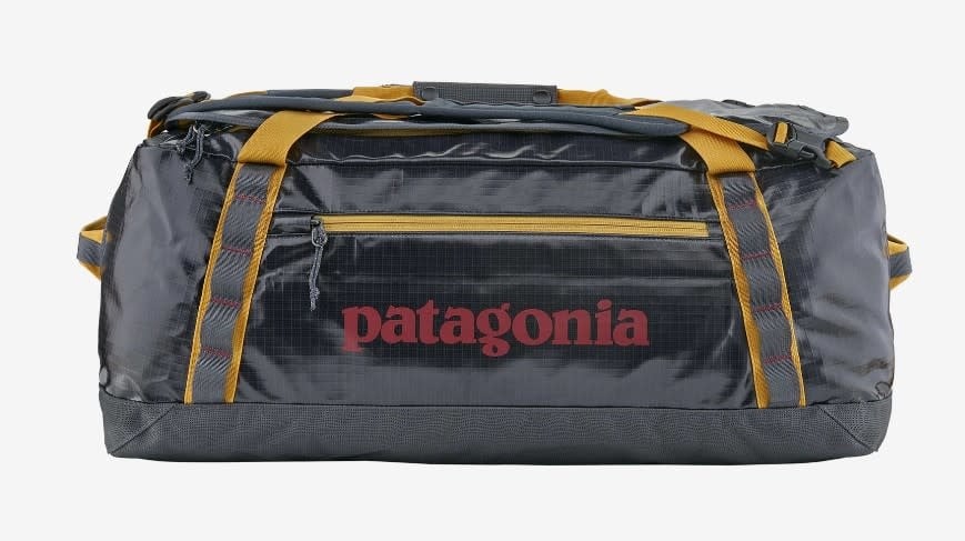 Patagonia Black Hole Duffel 70L in Smolder Blue with Buckwheat Gold straps and zippers