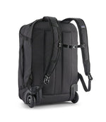 Patagonia Black Hole MLC Wheelie 34L back view showing backpack straps and wheels in black
