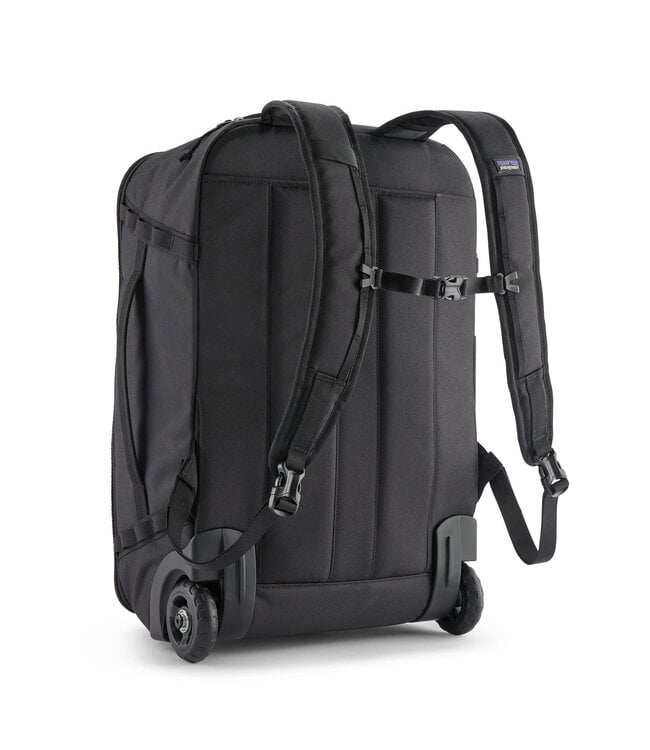 Patagonia Black Hole MLC Wheelie 34L back view showing backpack straps and wheels in black