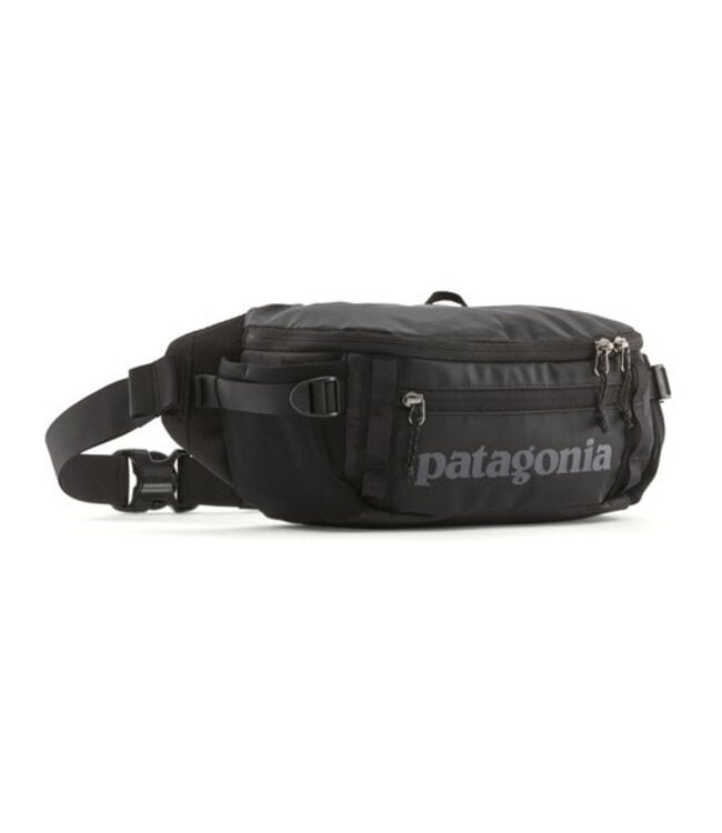 Patagonia Black Hole waist pack in black with adjustable strap and multiple compartments